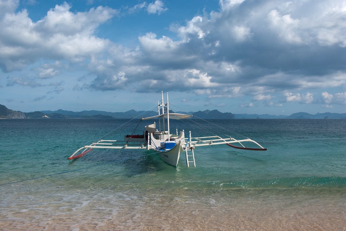 A traditional Filipino bangka outrigger, the boat used across Palawan