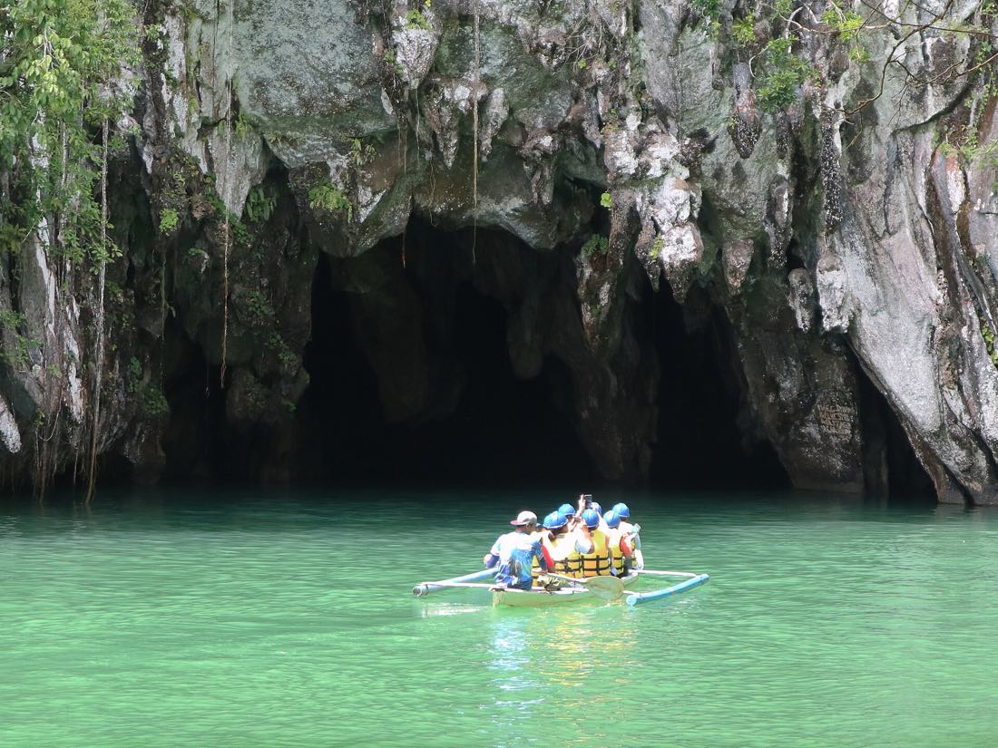 A paddle boat inside the Underground River cave at Cabayugan